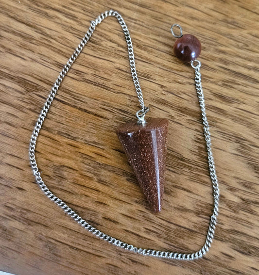 Gold sandstone pendulum